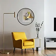 Round mirror in Entryway