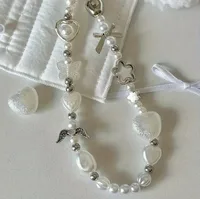 Lanière à breloques en chaîne de téléphone perlée pour iPhone Samsung, joli nœud blanc baroque, breloque en forme de fleur, accessoires universels, pendentif de bijoux 3