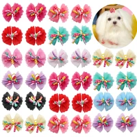 100PCS Dog Bows Volumes Ribbon Pet hair bows Dog Lace Bowknot Rubber bands Cute Dog Hair accessories Porcelain Gift For Dogs 1