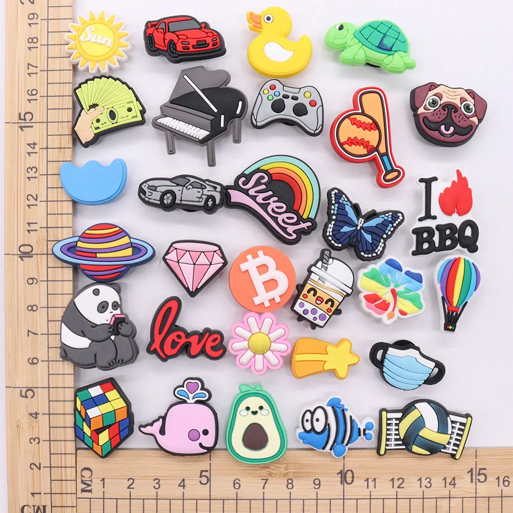 

Mix 50Pcs PVC Croc Charms Fish Baseball Flower Avocado Planet Butterfly Volleyball Diamond Whale Rainbow Garden Shoes Button