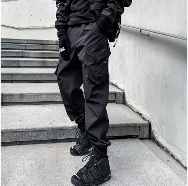 Autumn and winter men's pure black multi-pocket cargo pants trend loose bunched feet casual pants  size 3XL 5