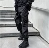Autumn and winter men's pure black multi-pocket cargo pants trend loose bunched feet casual pants  size 3XL 5