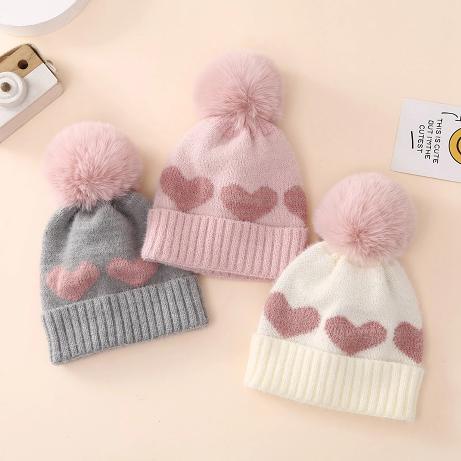 

EWODOS 0-12M Infant Baby Girls Winter Hat Cute Heart Pattern Plush Pom Knit Beanie Warm Hospital Cap for Infant Cold Weather