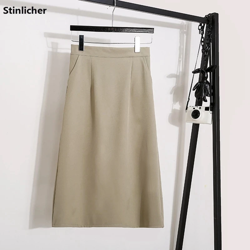 

Simple Pocket Split Umbrella Skirt Women Elastic High Waist Solid Color Korean Fashion Office Ladies Work Midi Skirts