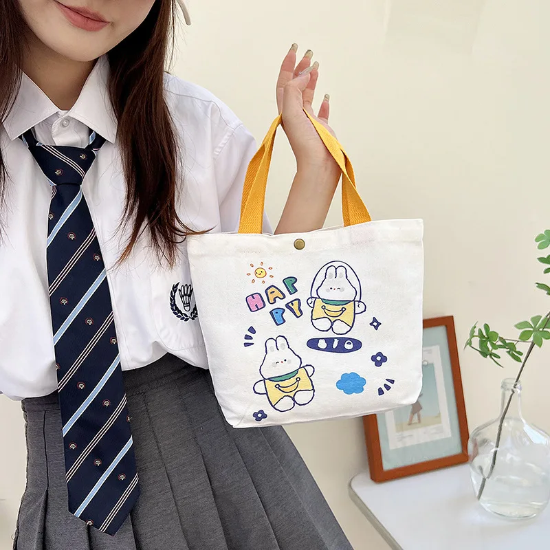 

Custom Canvas Bag Ins Style Hand Gift Student Children Small Handbag Wholesale Bag Female Mini Hand Gift Set Color Printing