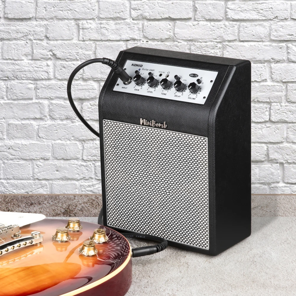 

KG-15 Mini Bomb Electric Guitar Amplifier Speaker Bluetooth Bass Amp with Distortion Delay Function Musical Instruments Speaker