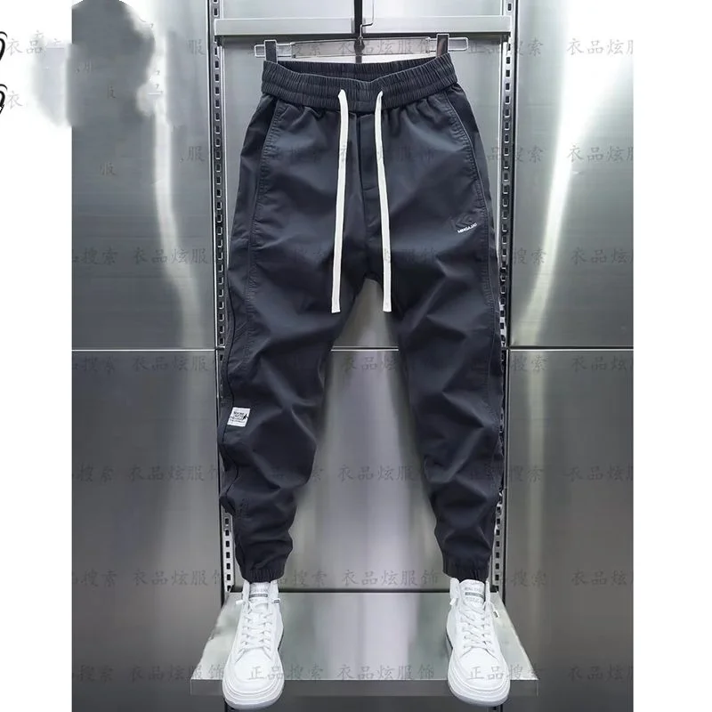 Spring Autumn Solid Color Fashion Elastic Waist Haren Pants Man Korean Style High Street Pockets Patchwork Drawstring Trousers