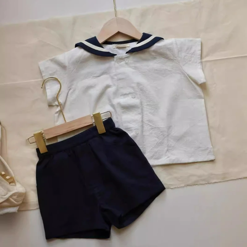

Летний хлопковый костюм для мальчиков, в стиле академии, новый топ и шорты для мальчиков, Детский комплект из двух предметов, Детская подходящая одежда, комплекты брюк, 2024