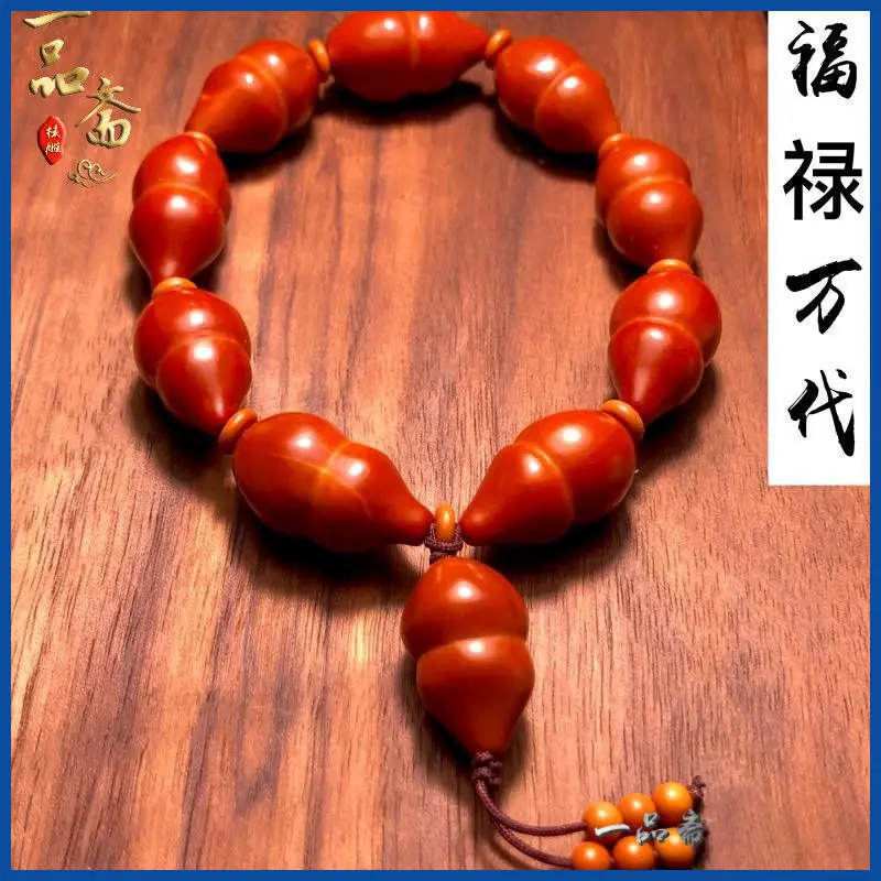 

Hand Olive Nut Carved Crafts Gourd Bracelet Male Plain Core Perfect Circle Light Bead Stone Carving Single Seed