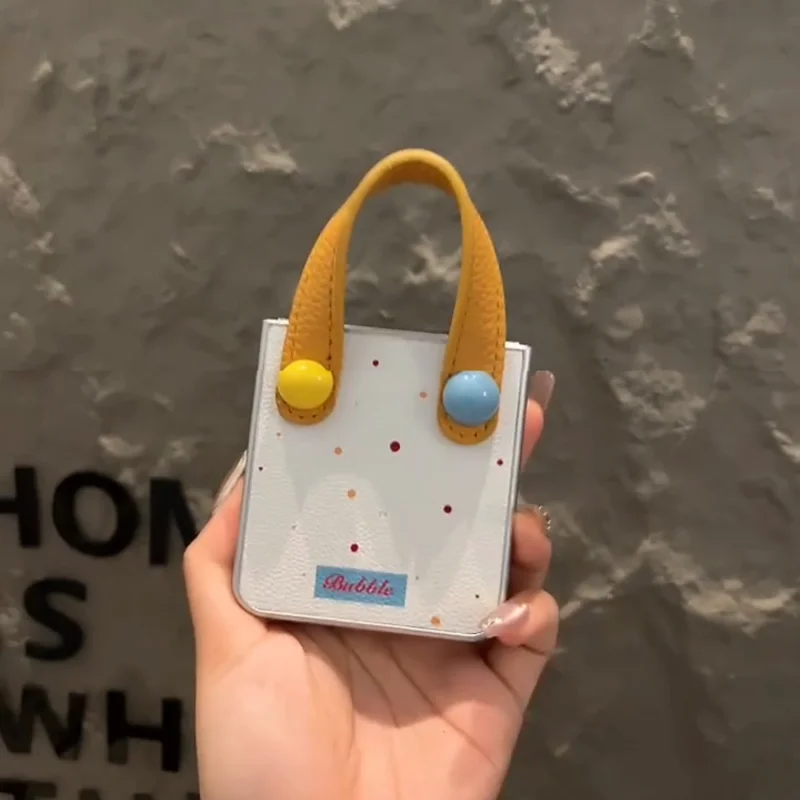 Charming Leather Wave Point Phone Case with Colorful Ball Wrist Strap
