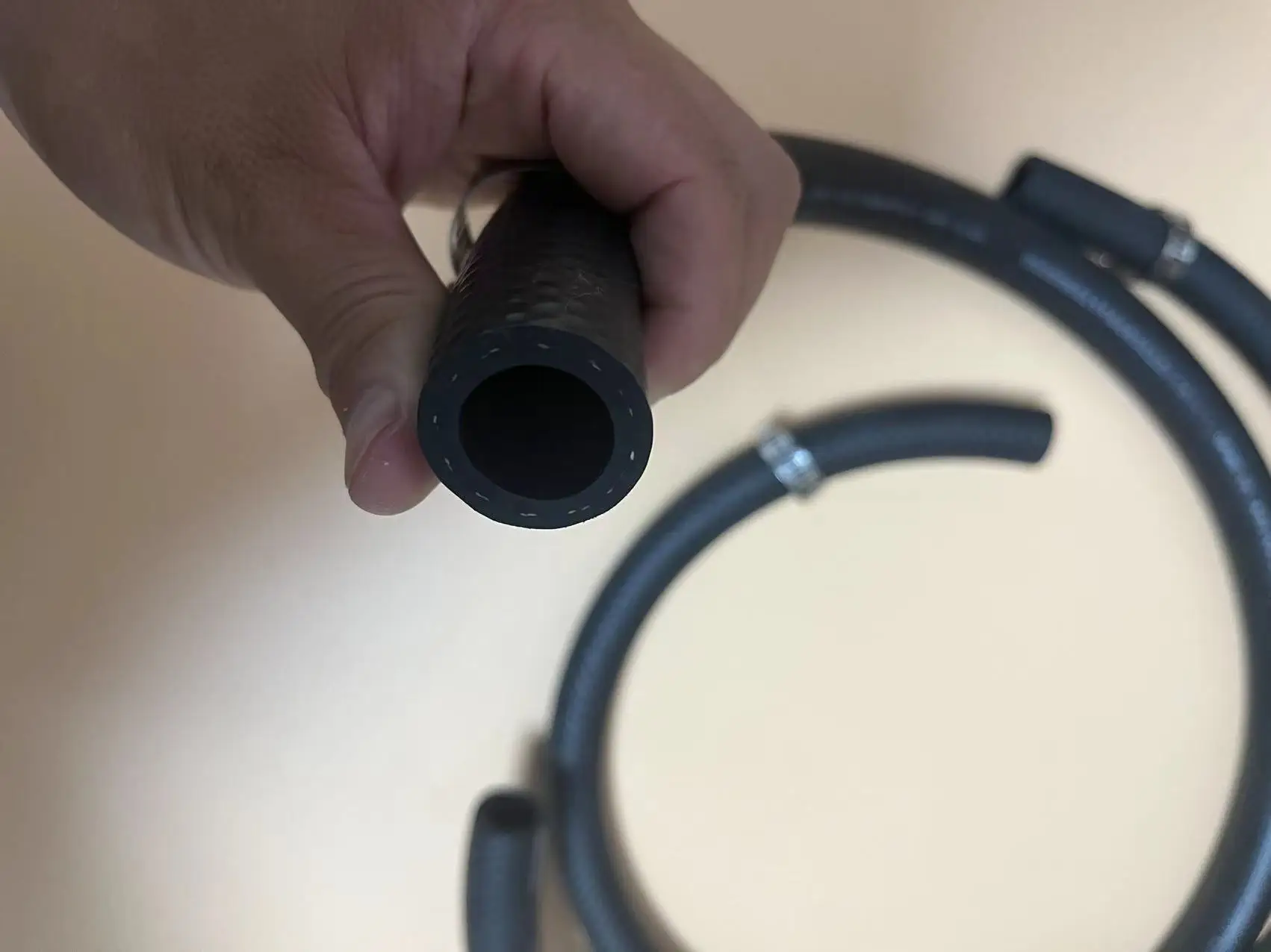 Oil and fuel resistant rubber hose for automotive and machinery