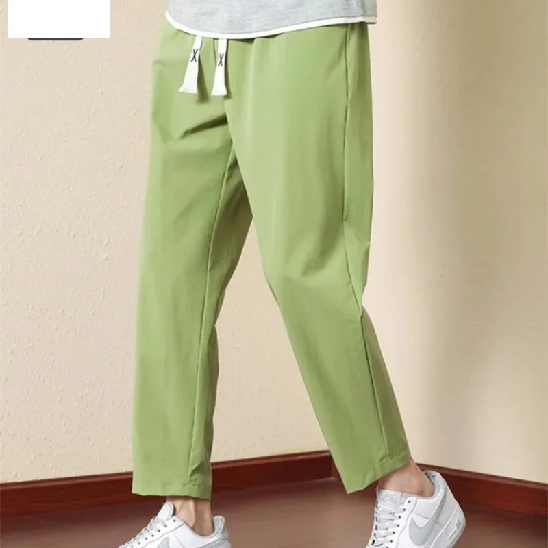 Men's Spring Summer Solid Pockets Drawstring Bandage Elastic High Waisted Casual Sports Small Leg Trousers Preppy Style Pants