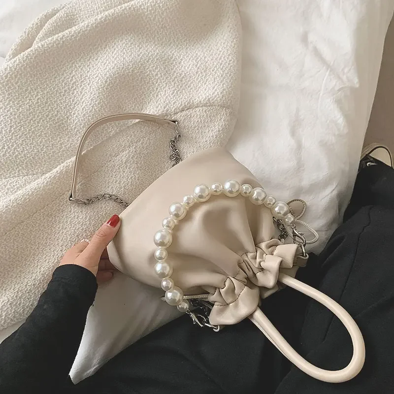 Hand-held pleated bag for women summer 2023 new trendy fashion pearl bucket bag niche design versatile crossbody bag