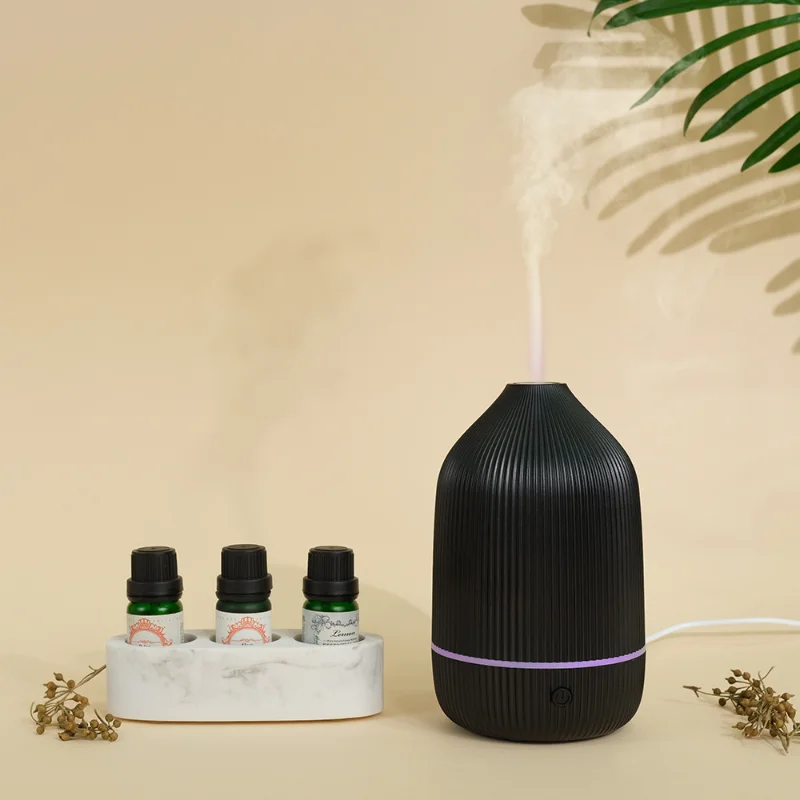 

Air Humidifier USB Essential Oil Diffuser with Color Lights Aromatherapy Machine Mini Ultrasonic Aroma Diffuser for Bedroom