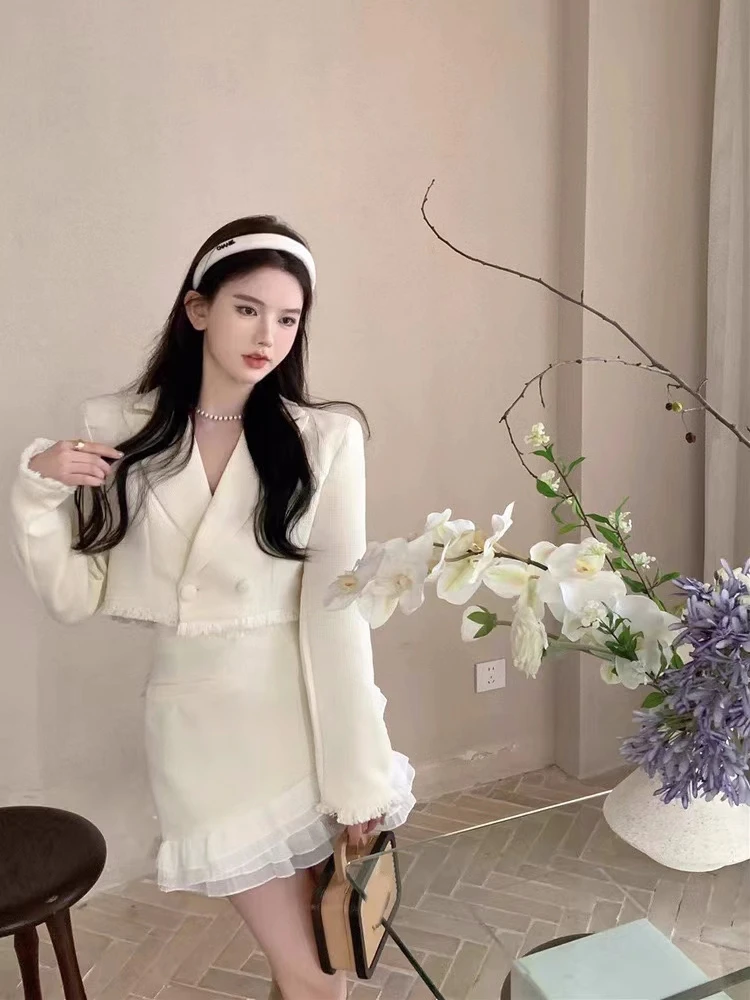 Conjunto de falda de dos piezas de lujo para mujer, chaqueta corta con solapa y volantes, minifalda ajustada de retazos, moda coreana, otoño