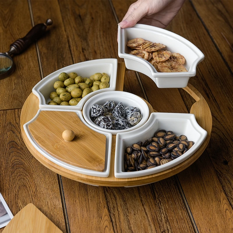 https://ae01.alicdn.com/kf/Sdac478ea44ee4f7f9bcea378f71b3800Y/Nordic-Art-Ceramic-Compartment-Fruit-Snack-Tray-with-Lid-Rotatable-Tray-Living-Room-Office-White-Dried.jpg