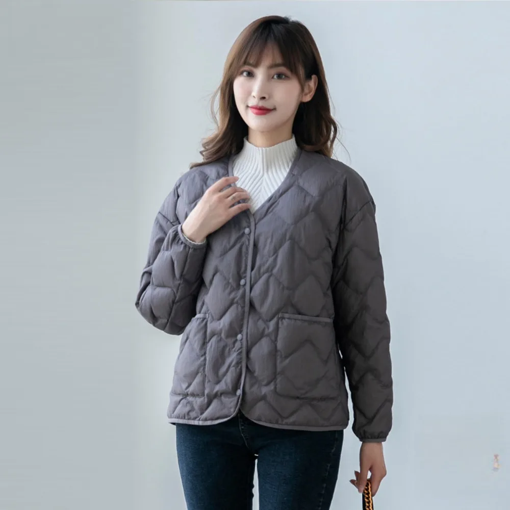 Рисунок 5 - Женский пуховик в клетку со стразами