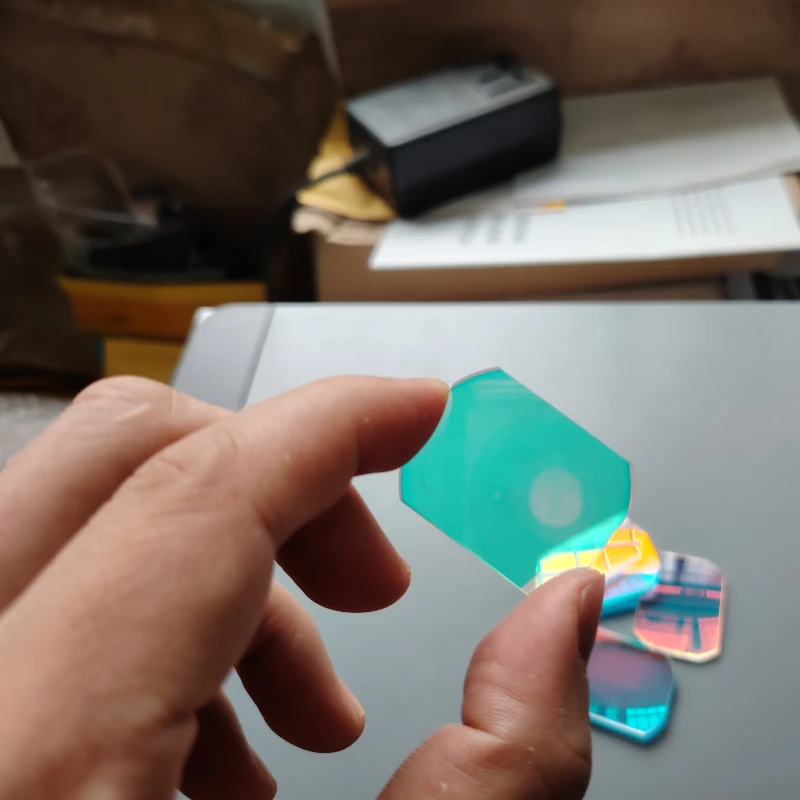 Description Picture 5 of item5Pcs Defective 30x39mm Concave-Convex  Lens Half Reflect Transmission Aspheric Laser Lens Beautiful Coating Prisms Stained Glass