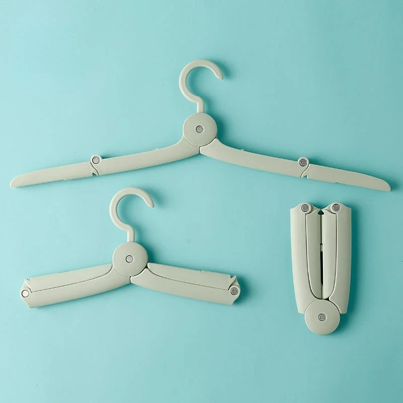 

1PCS Portable Folding Hangers Non Slip Plastic Hanger for Clothes Travel Home Telescopic Clothes Drying Rack Save Wardrobe Space