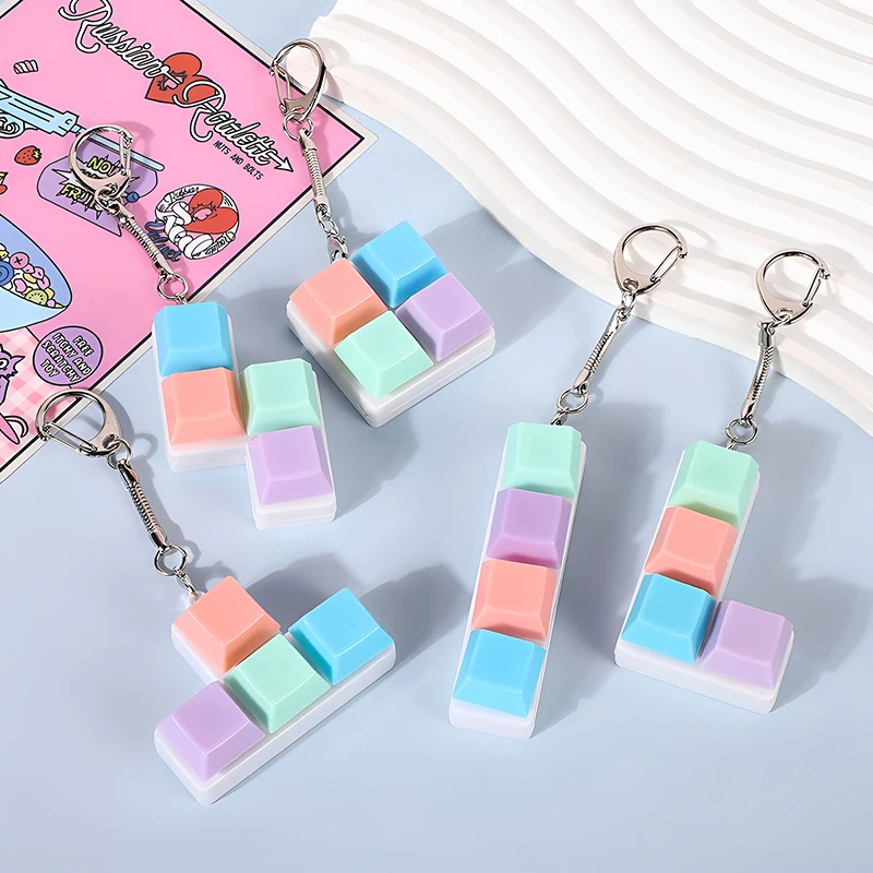 Kreative Dekompressions-Tastatur mit Macaron-förmigen Tastenkappen, Dekompressions-Schlüsselanhängern und kleinen Spielzeuganhängern – Detail 1