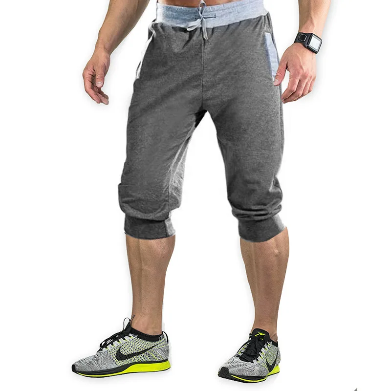 New cross-border sports pants men's casual jogging shorts elastic fitness pants cropped pants M-4XL