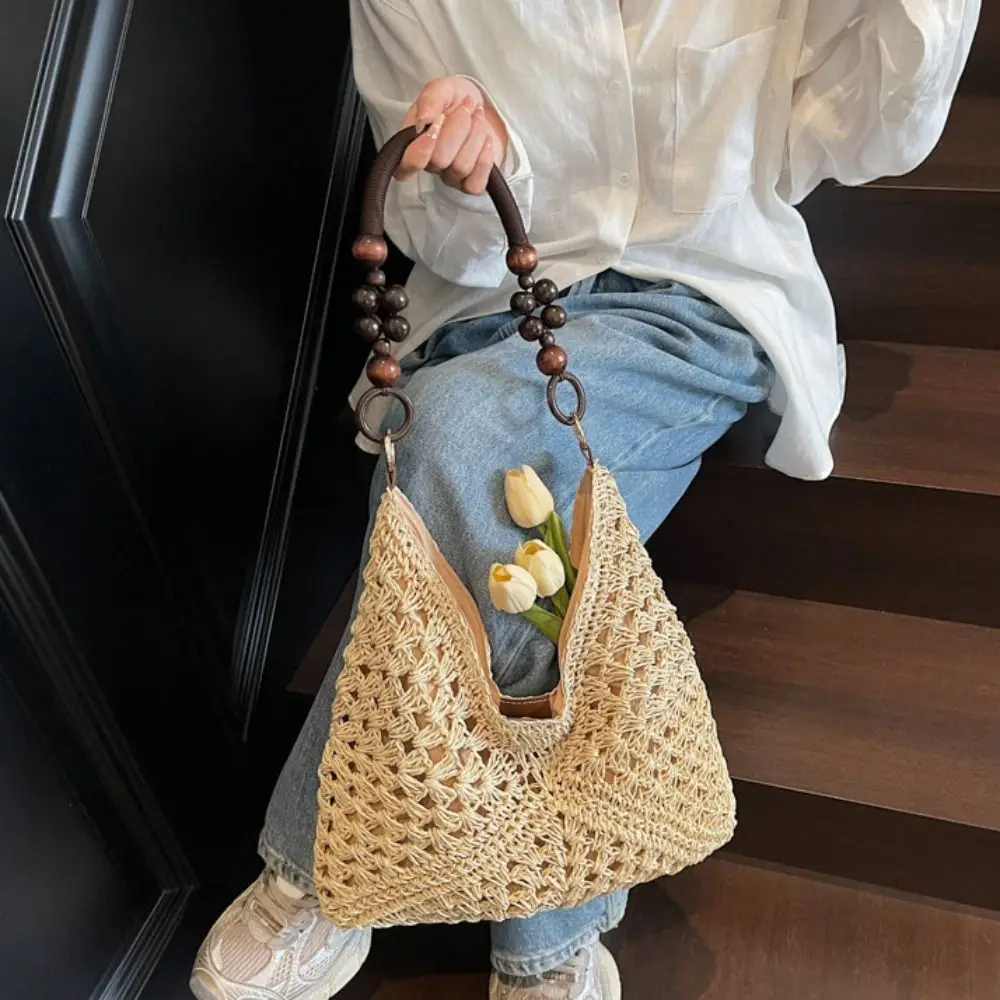 Borsa a secchiello traforata in paglia, grande capacità, stile bohémien, da spiaggia e a tracolla, per le vacanze - immagine 4