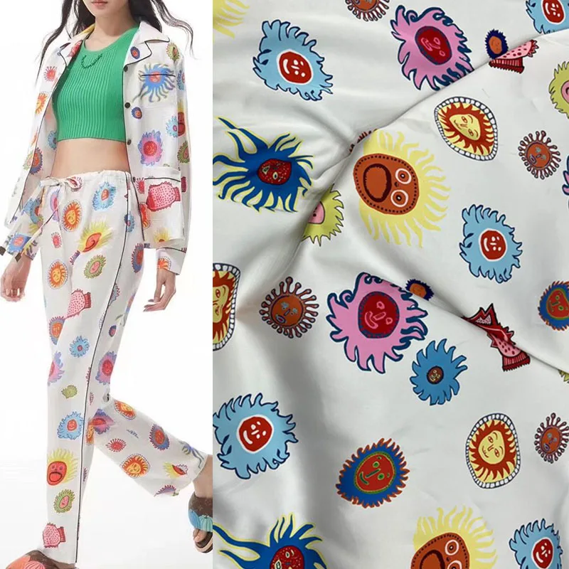 

Европейская и американская атласная ткань с принтом солнца и Бога из искусственного шелка для женщин платье блузка брюки Ручная работа Ткань для шитья