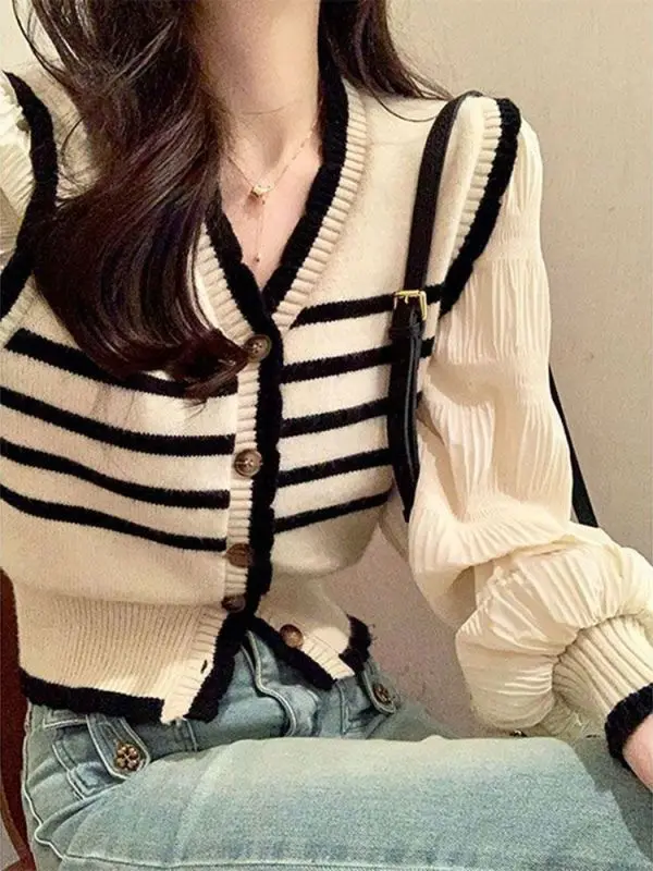 

Short Knit Cardigan Coat Female Spring Dress Design Sense Niche Unique Unique Fake Two Korean Waist Waist Blouse
