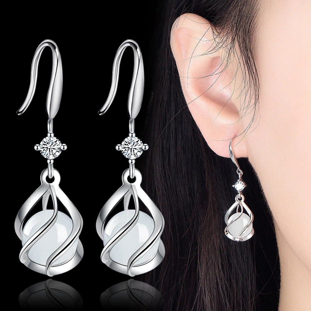 Fanqieliu 925 Silver Needle Lady'S Opal Jewelry New Fashion Hollow Cage Occhi Di Gatto Orecchini Pendenti In Pietra Fql23515