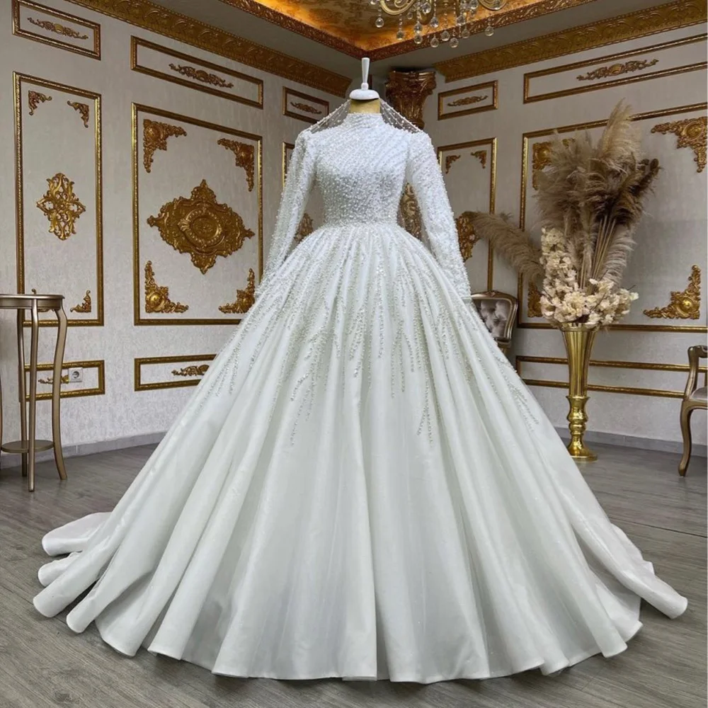 

Gorgeous High Neck Heavy Pearls Wedding Dress Robe De Mariee Luxe 2024 Chapel Train Long Sleeves Muslim Ballgown Bridal Gowns