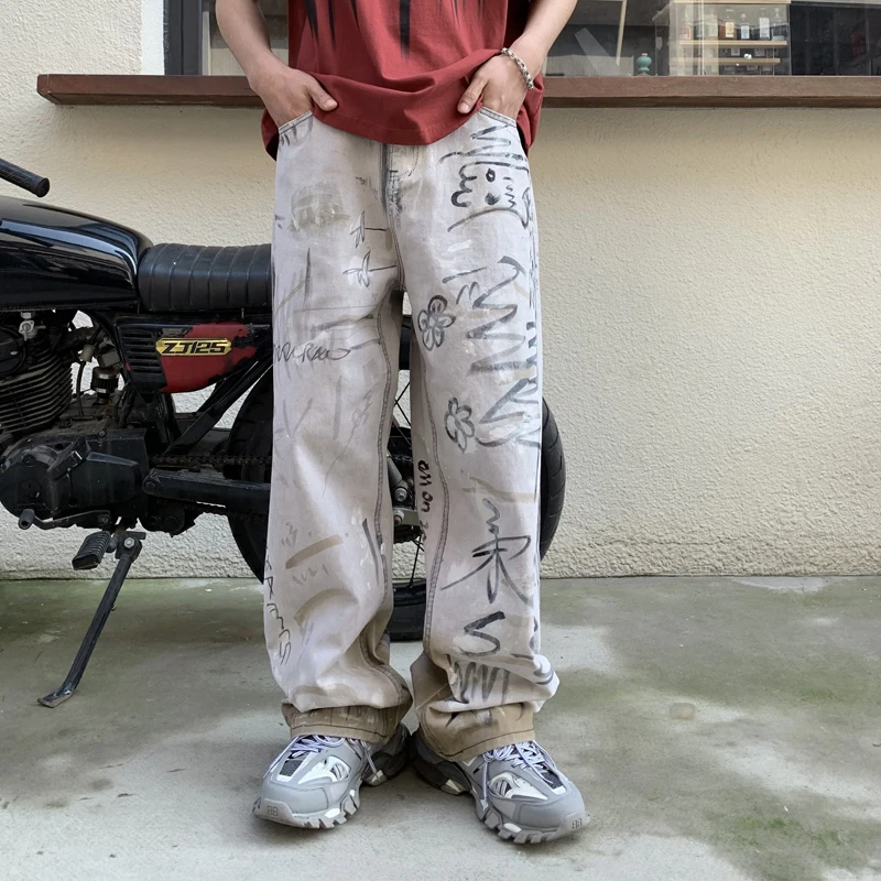 American street handsome personality graffiti men's jeans skinny loose straight trend printing wide-legged match men's pants