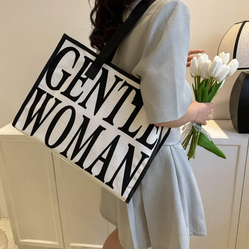 

Single Shoulder Canvas Bag Women's New Fashion Outgoing Handheld Shopping Bag Large Capacity Commuting Tote Bag