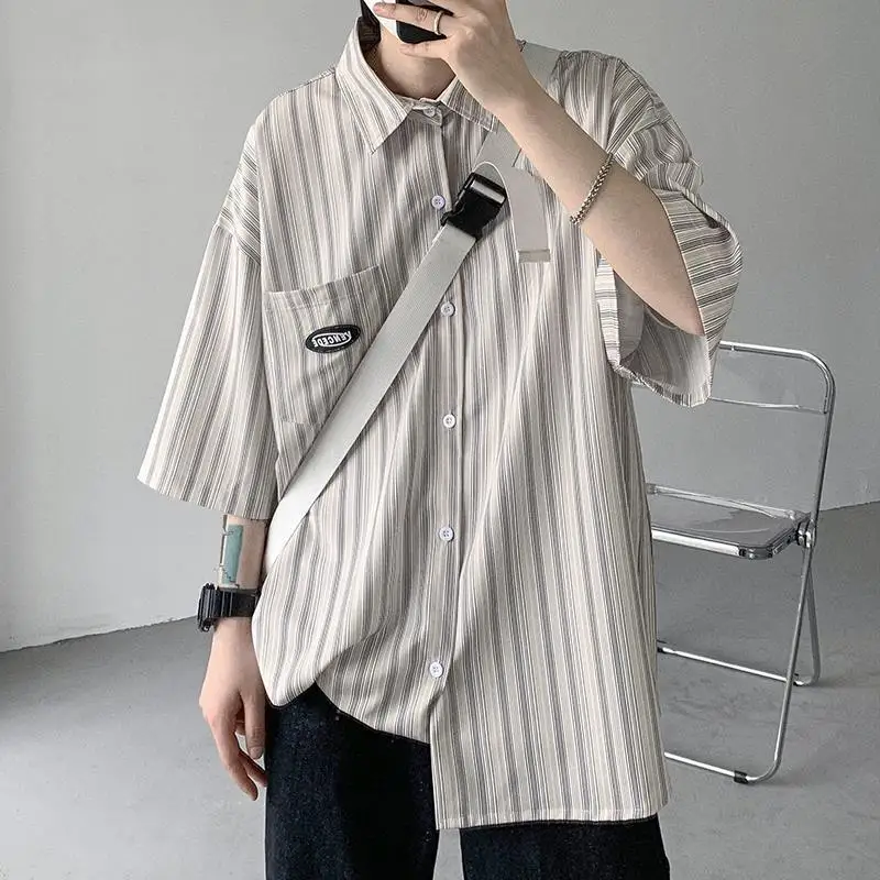 

Striped shirt men's summer fashion brand ins Hong Kong style Japanese handsome short-sleeved shirt loose five-quarter sleeves