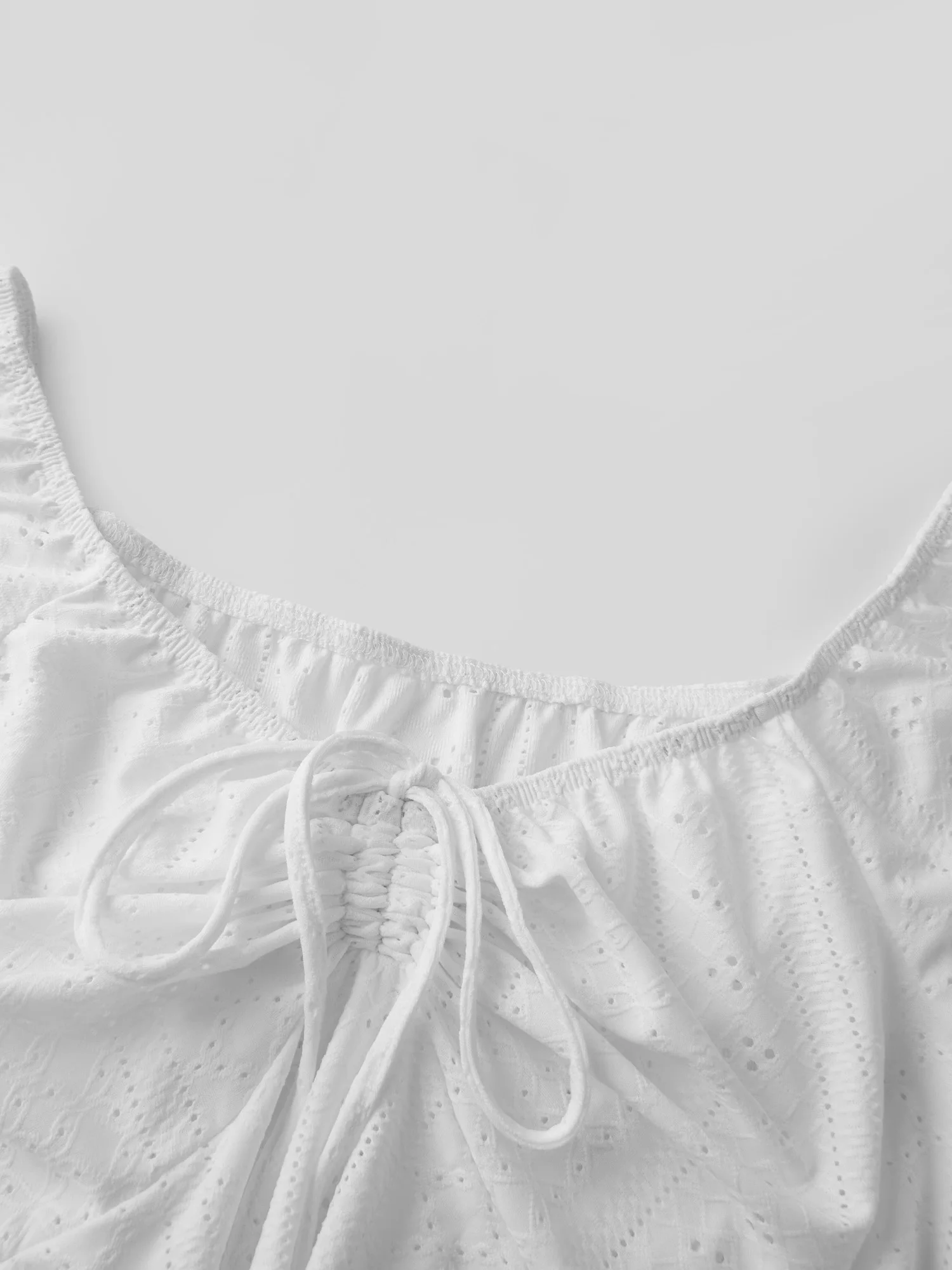 Stylish Women s Off Shoulder Blouse with Short Puff Sleeves and Tie Up Detail Featuring Irregular Hem and Eyelet Design in