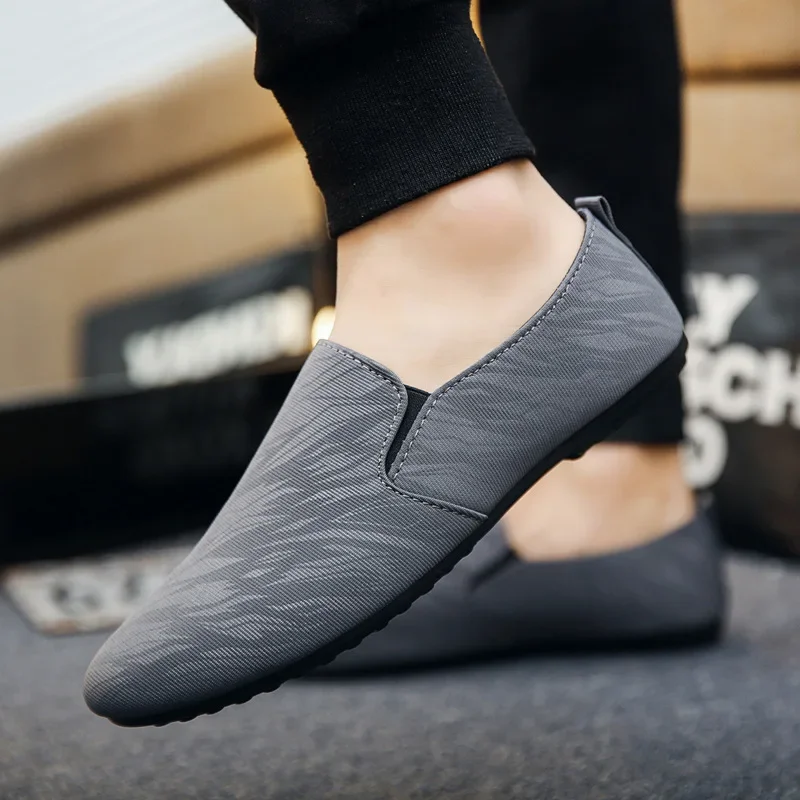 2023 Men Flat Casual Loafers Trend Slip on Sport Shoes Fashion Light Breathable Solid Color Walking Shoes Zapatillas Hombre 2