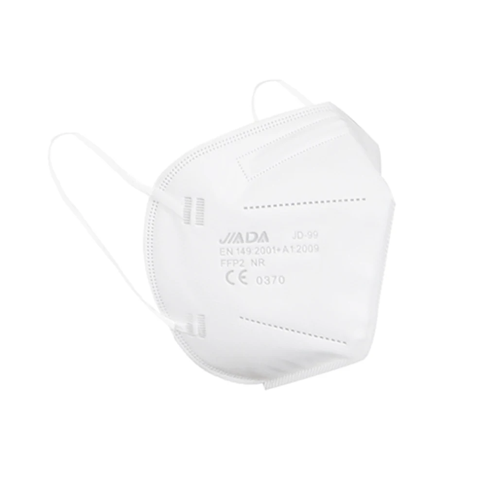 Détail des 5 couches filtrantes d'un masque FFP2, protection respirante