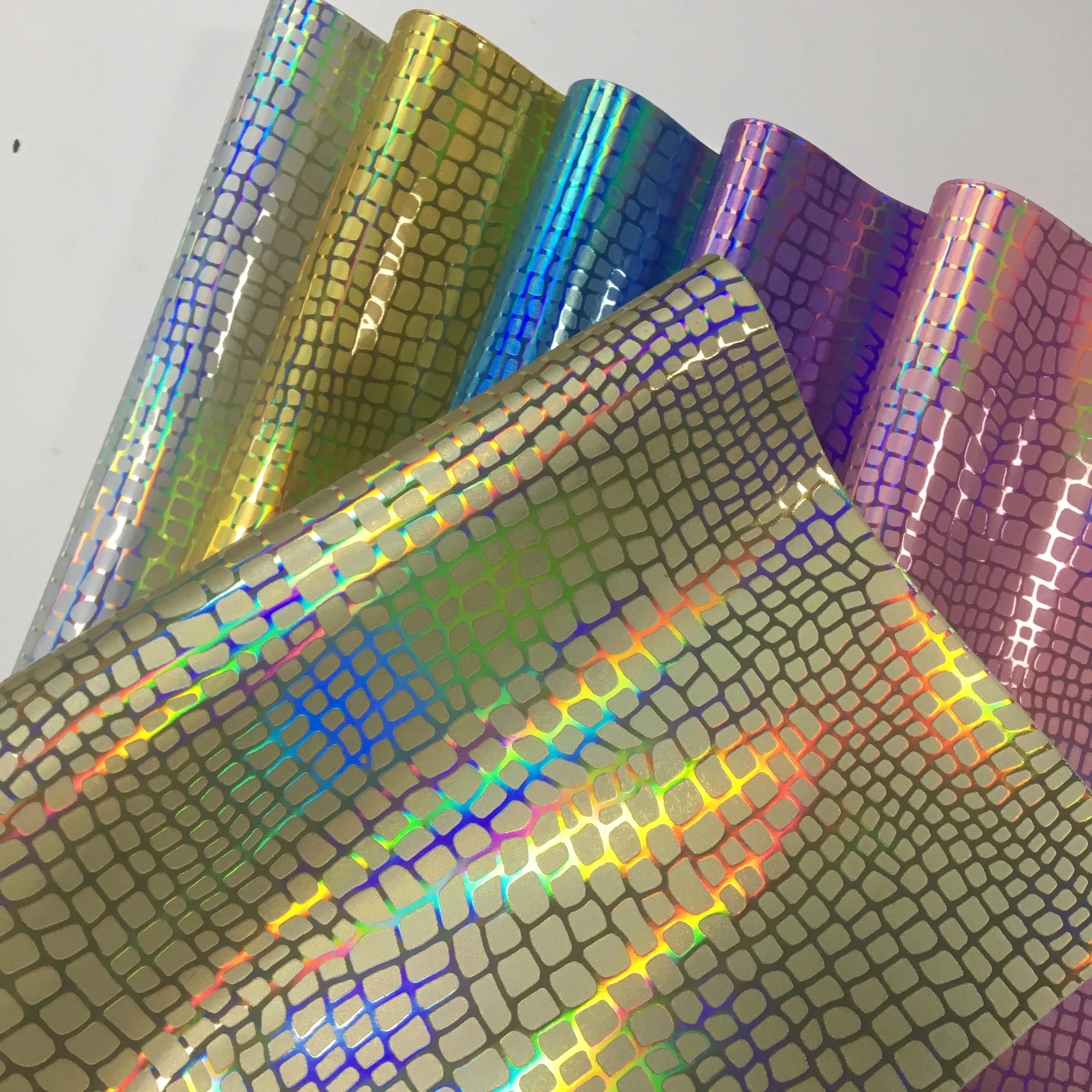 

Stripe Embossed PU Holographic Metallic Mirror Laser Faux Leather Fabric Sheet for Making Shoe/Bag/Handbag/Craft 46*135cm