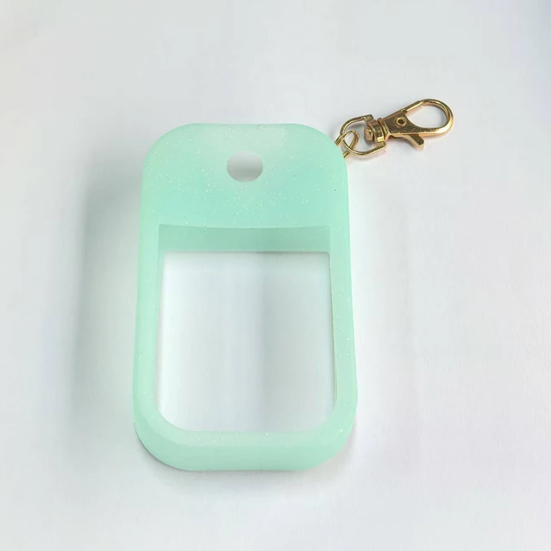 Vue latérale de l'étui en silicone pour Touchland 30ml, solution hydroalcoolique bien maintenue.