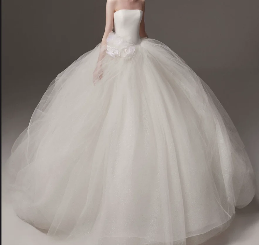 New minimalist wedding dress with fairy flowers and dreamy designs