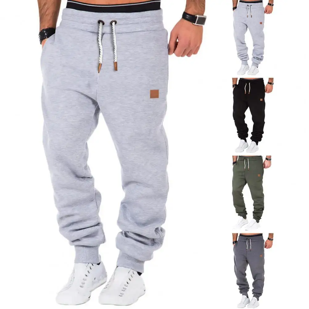 

Men Sports Pants Drawstring Elastic Waist Solid Color Pockets Soft Breathable Stretchy Ankle-banded Men Jogging Gym Trousers