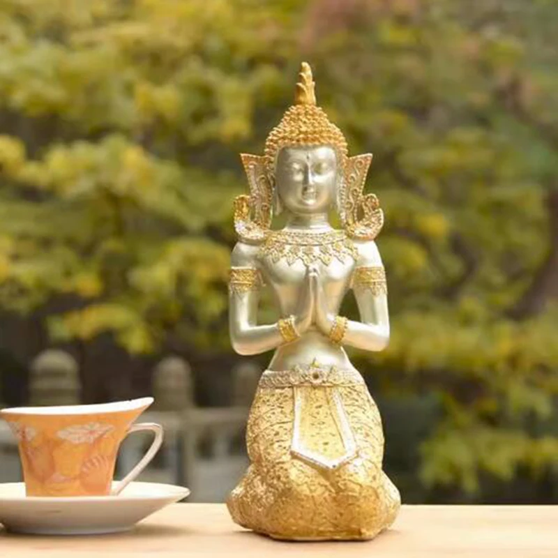 

Living room, home, residential area, Southeast Asia kneeling Buddha statue, Thai restaurant doorman welcoming Thai style handic