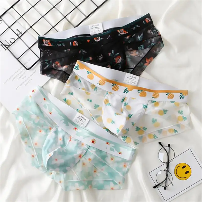 

2022 New Ice Silk Sexy Men's Briefs Printing Trend Underwear Transparent Low Waist U-shaped Bag Men's Elastic Body Underwear