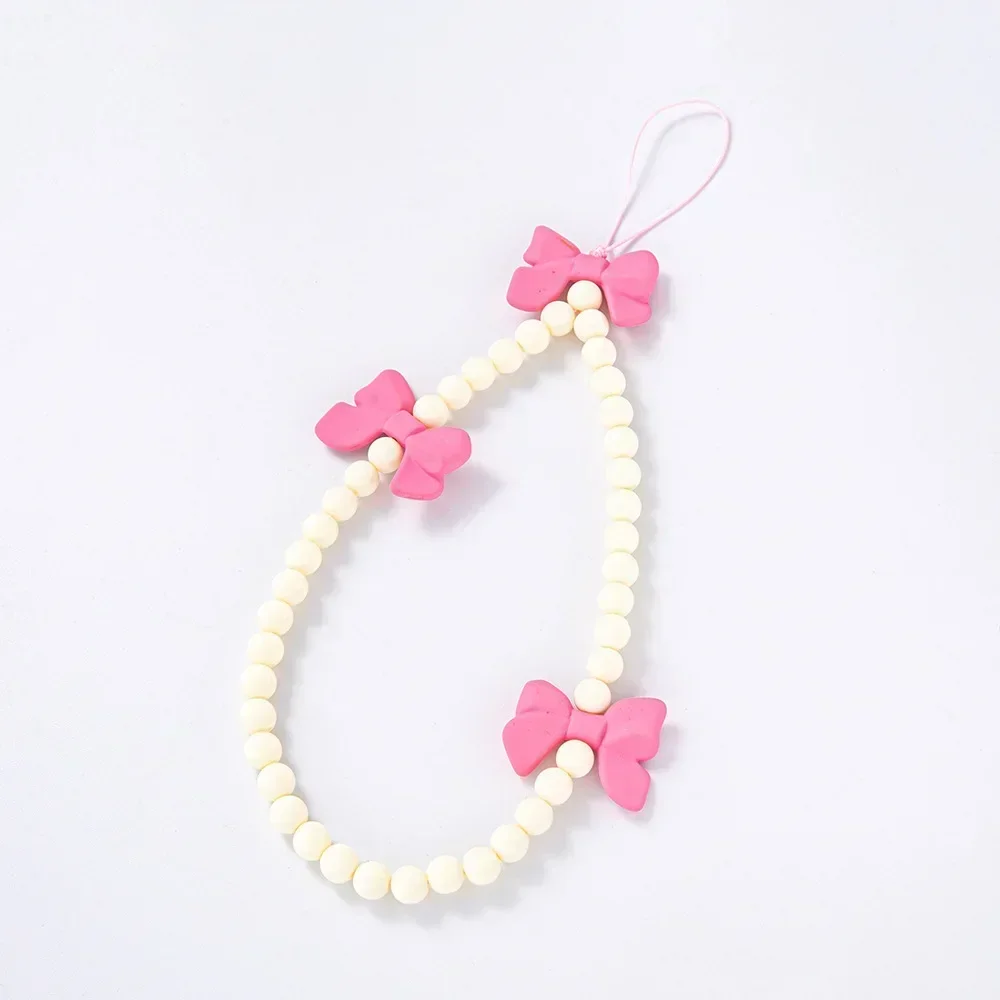 

2024 New Acrylic beads with spray-painted bow, elegant accessories, mobile phone pendant, wrist lanyard