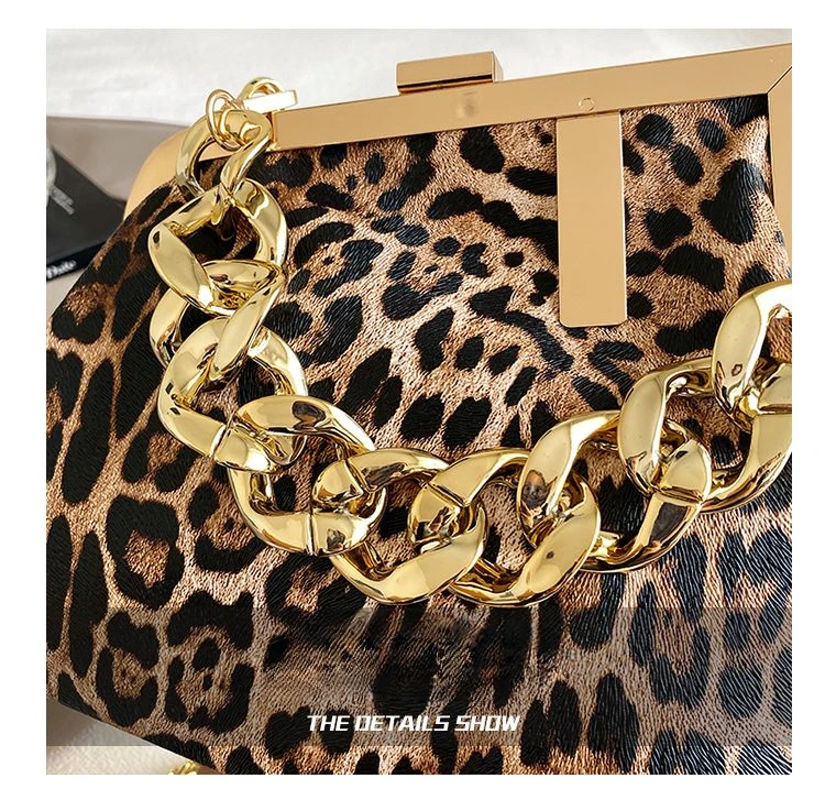 Carauana UNIU Leopard Clutch lock closure detail