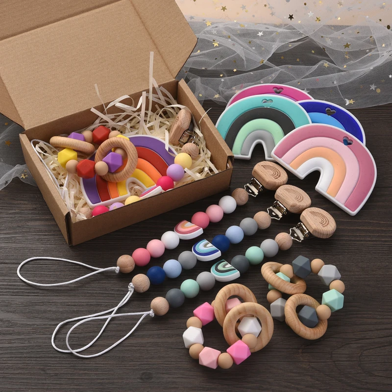 

Baby Cartoon Rainbow Teether Toy Wooden Silicone Baby Pacifier Clip Chain Teething Hand Ring Boxed Set For Infant Care Chew Gift