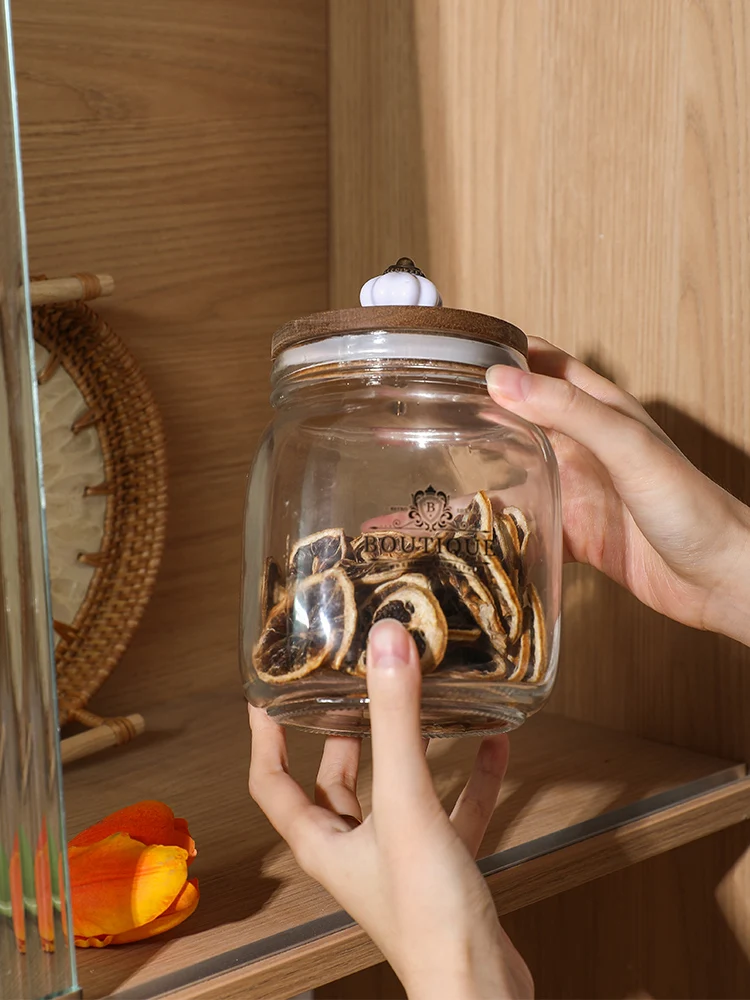 https://ae01.alicdn.com/kf/Sdbdc86b69cef435e81dca6cf03fb680aJ/Transparent-Glass-Storage-Jar-Cereal-Grain-Sealed-Jar-Candy-Nuts-Box-Food-Grade-Storage-Container-Garlic.jpg