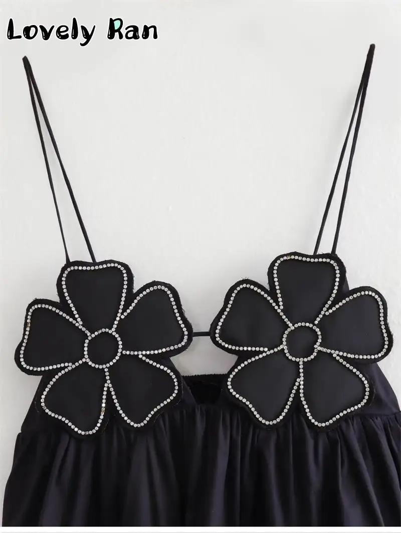 Top corto elegante con estampado floral negro a la moda para mujer, camisola Y2K con tirantes y espalda descubierta, ropa de calle elegante y sexy sin mangas para mujer