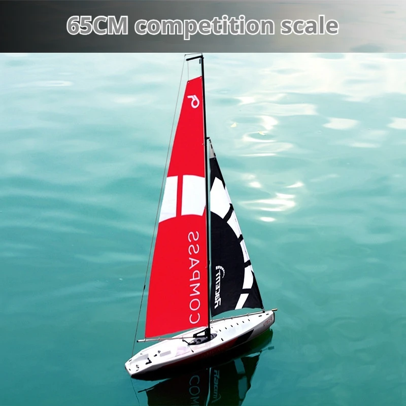 Vue latérale du bateau RC voilier 650mm, coque ABS sans moteur, voiles incluses