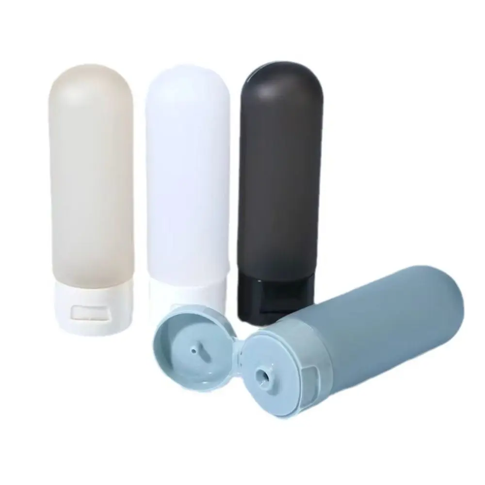Set of 4 Refillable Silicone Travel Bottles - Leak-Proof, BPA-Free, Portable, Squeezable Containers