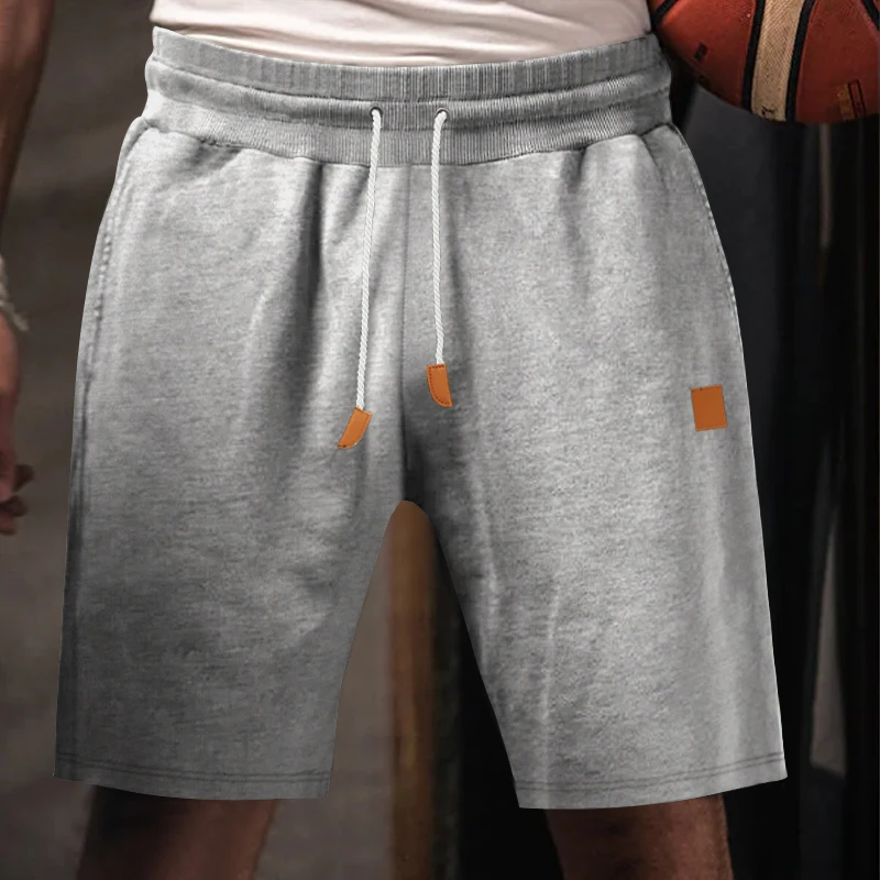 Spring summer men's leisure sports loose solid color draw rope skin straight leg quarter pants